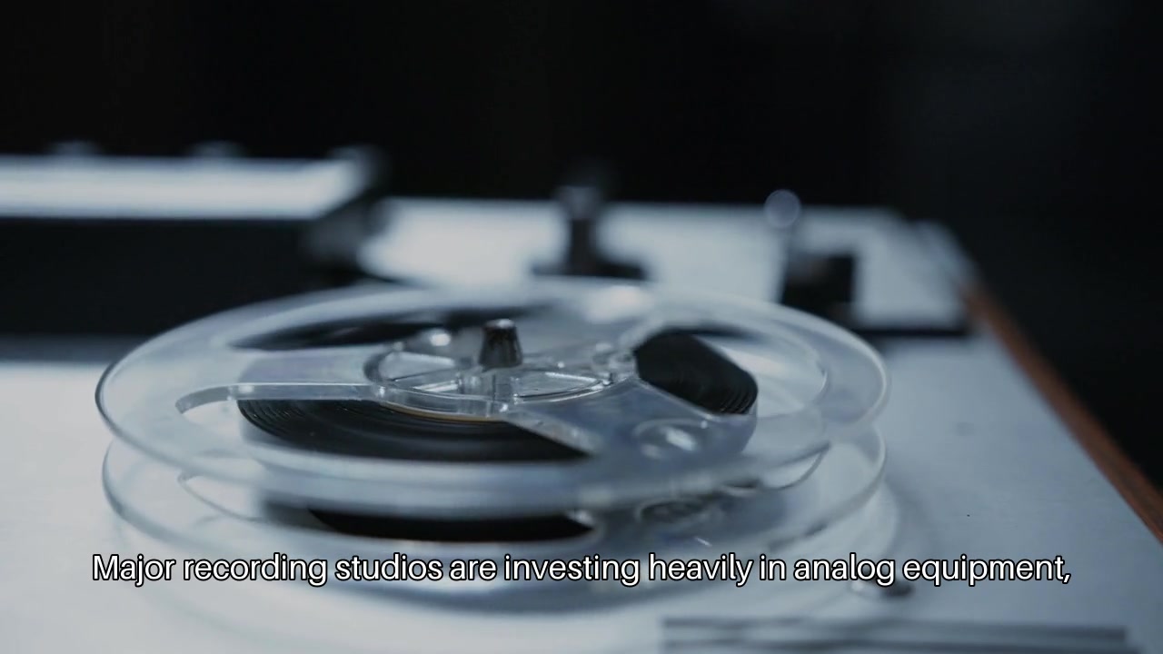 Footage matched to the script: an AI-selected reel-to-reel tape machine, not a generic 'music' clip.